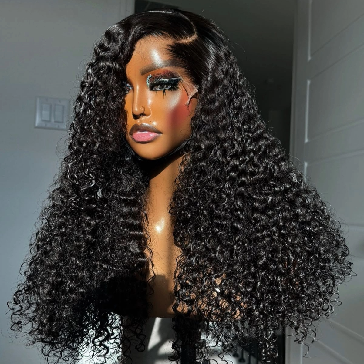 Nairobi Black Burmese Curly Wig – 2.5 bundles of natural Burmese human hair, soft, bouncy, and voluminous curly wig.